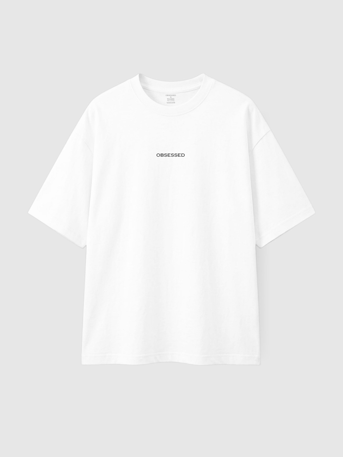 Camiseta São Jorge branca, frente com escrita Obsessed no peito