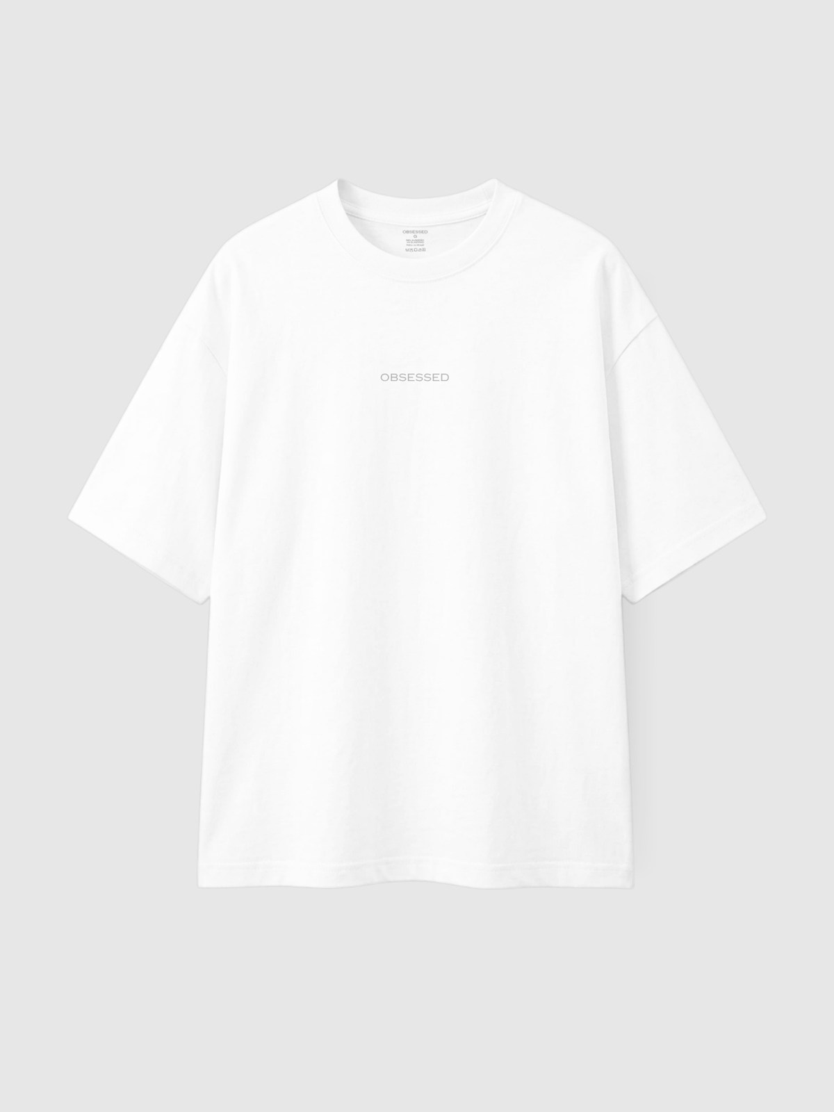 Camiseta Winner branca, frente com escrita Obsessed no peito